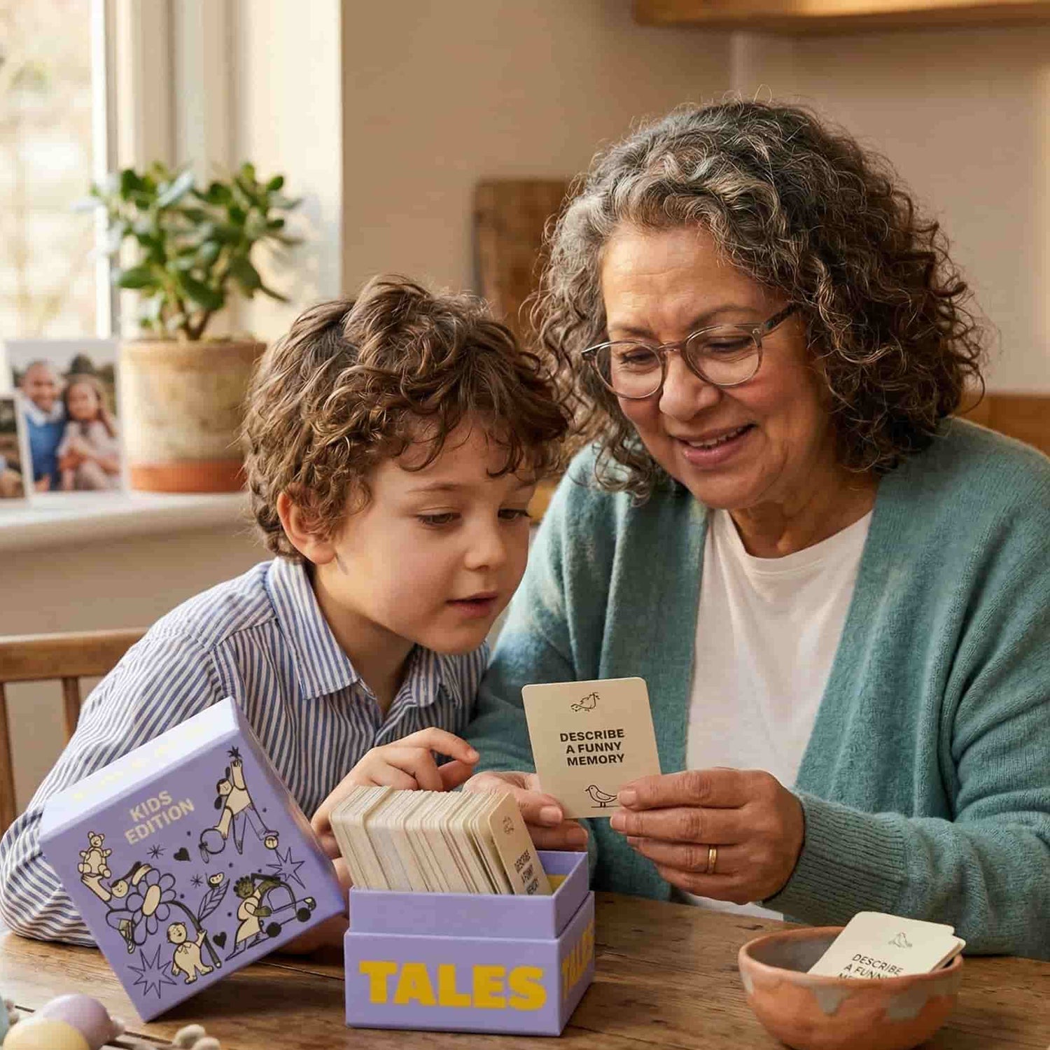 Grandmother and grandson playing with a card game at a table